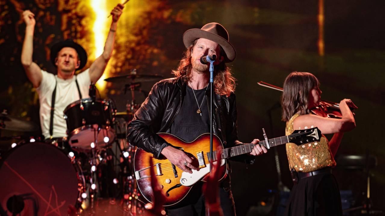 The Lumineers performing live on stage
